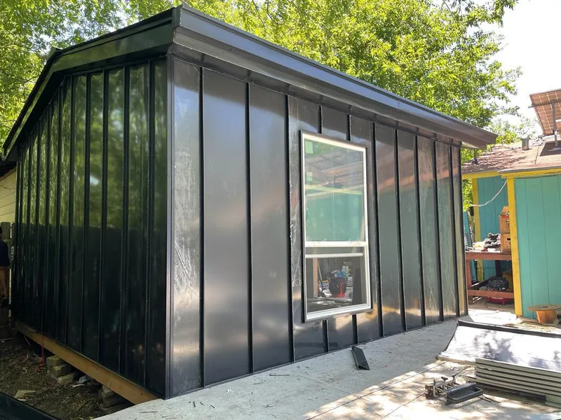 Black standing seam metal wall panels for Roof Inspection in Prospect Heights